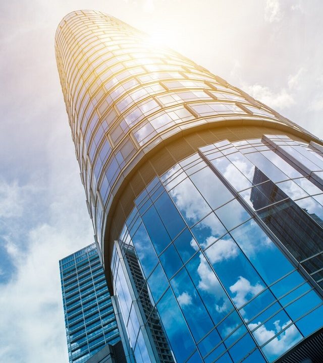 low-angle-view-modern-office-buildings_1359-40 low-angle-view-modern-office-buildings_1359-40